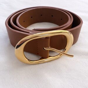 Faux leather- brown woman’s belt Size: Medium 29-32”